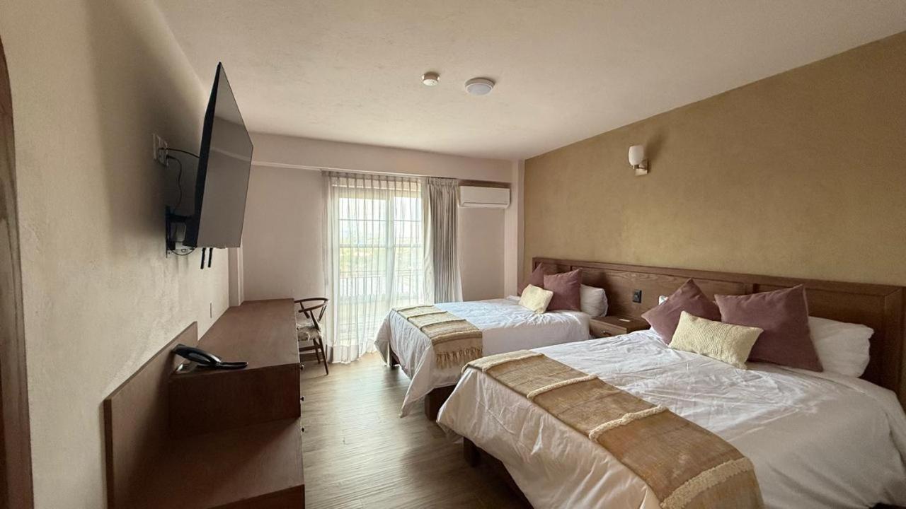 Hotel La Querencia Текуискуиапан Екстериор снимка